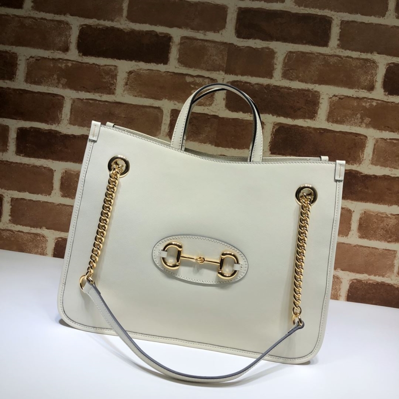 G*u*i shopping bags